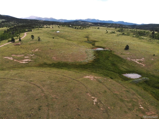 aerial view featuring a mountain view