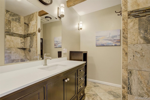 8320 Red Spring Valley Rd, Colorado Springs, CO 80919 - full bath with vanity, a tile shower, and baseboards