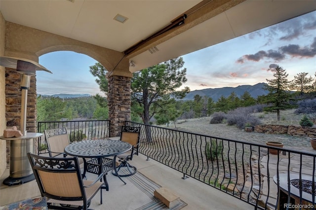 8320 Red Spring Valley Rd, Colorado Springs, CO 80919 - balcony at dusk with a mountain view
