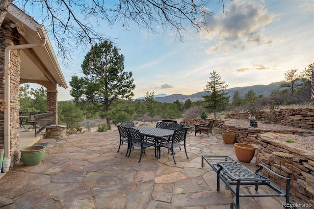 8320 Red Spring Valley Rd, Colorado Springs, CO 80919 - view of patio / terrace with a mountain view and outdoor dining area