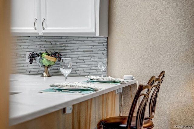 2428 W 82nd Pl Unit 1D, Westminster, CO 80031 - detailed view of tasteful backsplash and a textured wall