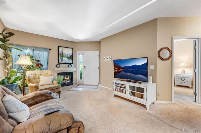 2428 W 82nd Pl Unit 1D, Westminster, CO 80031 - living area featuring carpet flooring and a glass covered fireplace