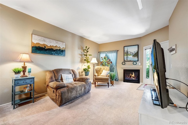 2428 W 82nd Pl Unit 1D, Westminster, CO 80031 - living area featuring carpet flooring and a glass covered fireplace