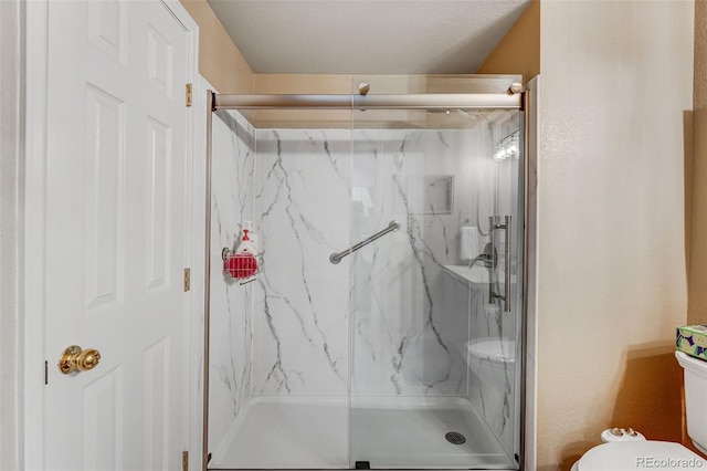 2428 W 82nd Pl Unit 1D, Westminster, CO 80031 - bathroom featuring a marble finish shower