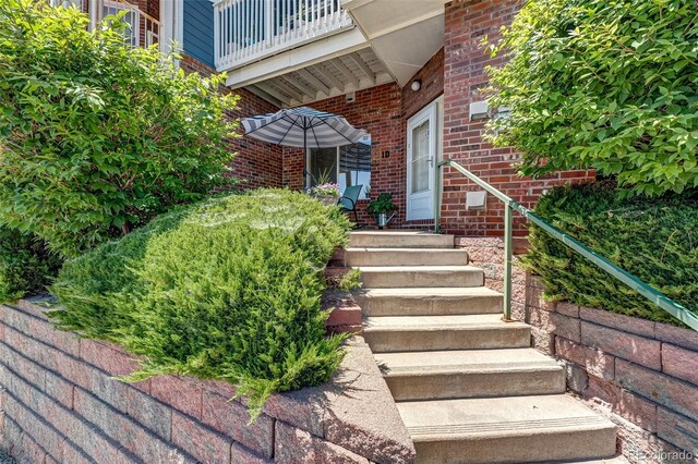 2428 W 82nd Pl Unit 1D, Westminster, CO 80031 - property entrance with brick siding and a balcony