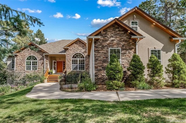 front facade with a front lawn