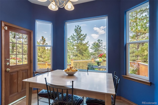 dining area featuring a chandelier