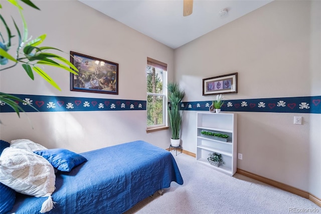 carpeted bedroom featuring ceiling fan