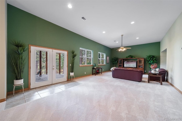 bedroom with light colored carpet, access to exterior, ceiling fan, and french doors