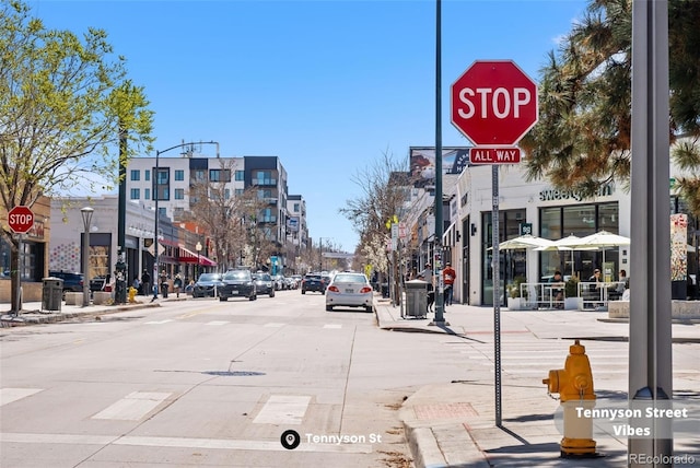 1907 W Elk Pl, Denver, CO 80211 - view of street featuring traffic signs, sidewalks, street lights, and curbs