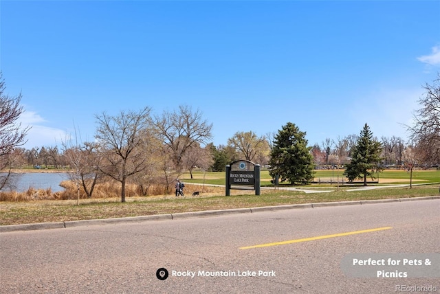 1907 W Elk Pl, Denver, CO 80211 - view of asphalt road with curbs and a water view