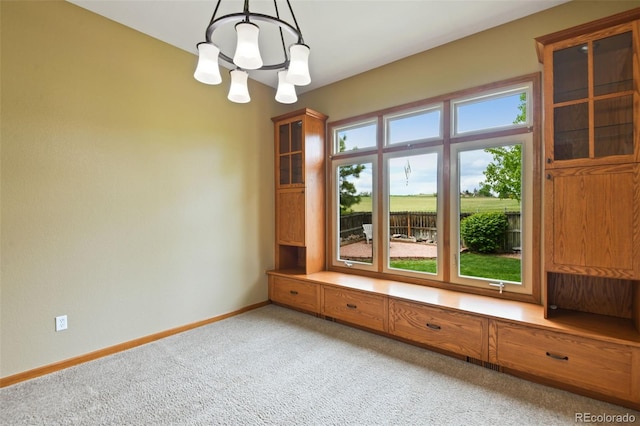 8286 W 108th Pl, Westminster, CO 80021 - unfurnished dining area featuring light carpet and a chandelier