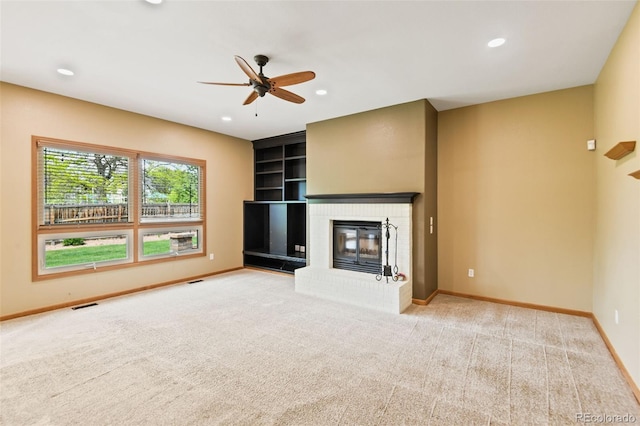 8286 W 108th Pl, Westminster, CO 80021 - unfurnished living room featuring a ceiling fan, a fireplace, built in shelves, carpet, and recessed lighting