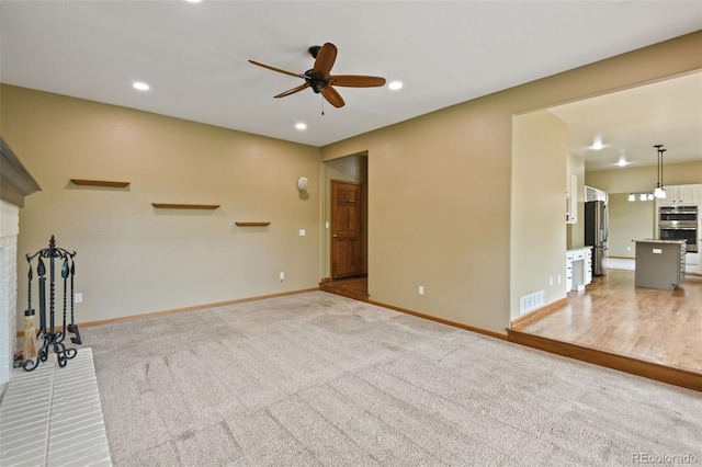 8286 W 108th Pl, Westminster, CO 80021 - unfurnished living room featuring a ceiling fan, light carpet, and recessed lighting