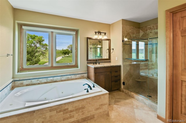 8286 W 108th Pl, Westminster, CO 80021 - bathroom with a whirlpool tub, vanity, a shower stall, and tile patterned floors