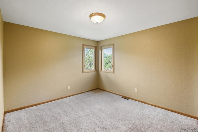 8286 W 108th Pl, Westminster, CO 80021 - spare room featuring carpet flooring and baseboards