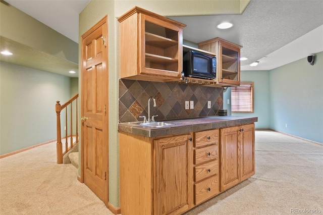 8286 W 108th Pl, Westminster, CO 80021 - kitchen featuring black microwave, light colored carpet, decorative backsplash, recessed lighting, and dark countertops