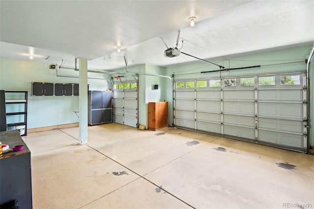8286 W 108th Pl, Westminster, CO 80021 - garage with fridge and a garage door opener