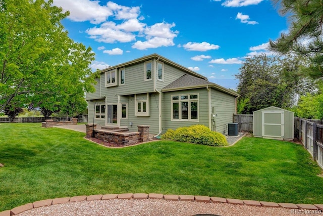 8286 W 108th Pl, Westminster, CO 80021 - back of house featuring a fenced backyard, a patio area, and a storage shed