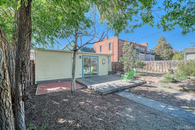 332 F St, Salida, CO 81201 - rear view of property with a fenced backyard, a wooden deck, and a patio area