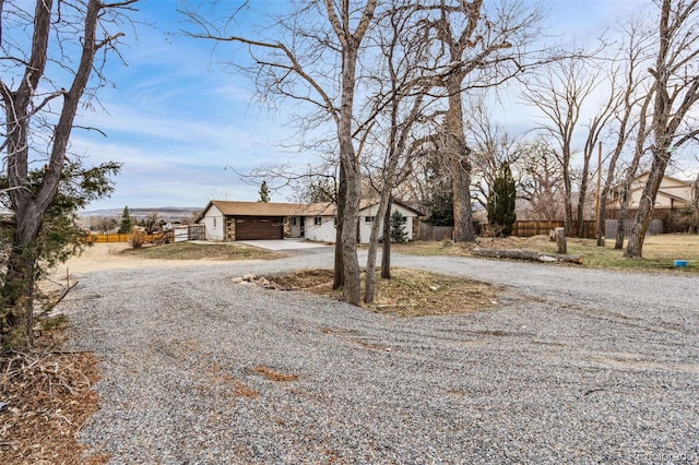 view of road with driveway