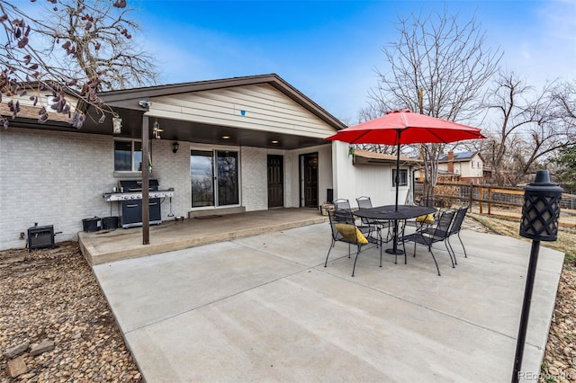 14290 W 54th Ave, Arvada, CO 80002 - view of patio featuring area for grilling and outdoor dining space