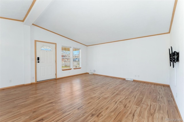 2019 S Fox St, Denver, CO 80223 - spare room featuring crown molding, light wood finished floors, and lofted ceiling