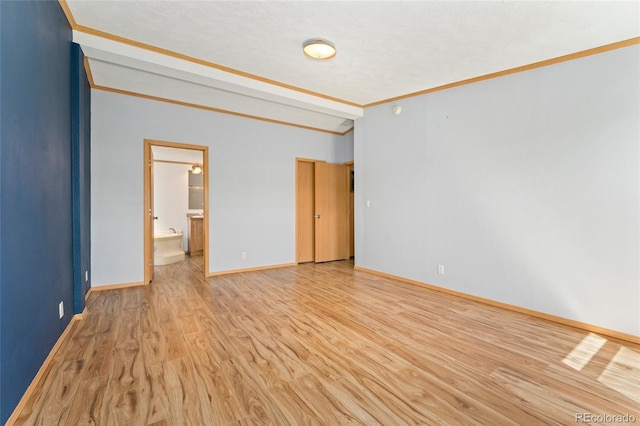 2019 S Fox St, Denver, CO 80223 - spare room with light wood-style flooring and crown molding