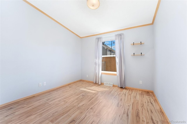 2019 S Fox St, Denver, CO 80223 - spare room featuring wood finished floors and crown molding