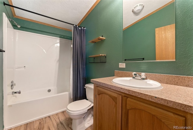 2019 S Fox St, Denver, CO 80223 - bathroom with a textured ceiling, a textured wall, wood finished floors, vanity, and shower / bath combo