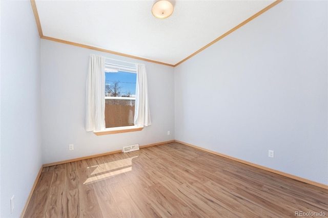 2019 S Fox St, Denver, CO 80223 - empty room featuring crown molding and wood finished floors