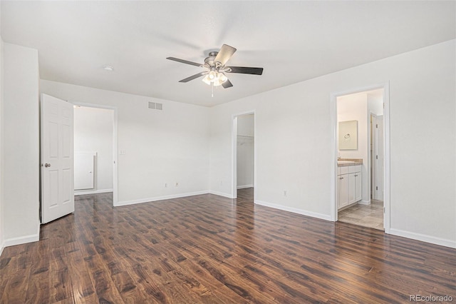 23841 E Alabama Dr, Aurora, CO 80018 - unfurnished room with a ceiling fan, wood finished floors, and baseboards