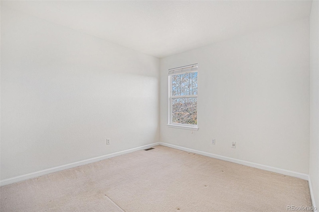 23841 E Alabama Dr, Aurora, CO 80018 - empty room featuring baseboards and light colored carpet