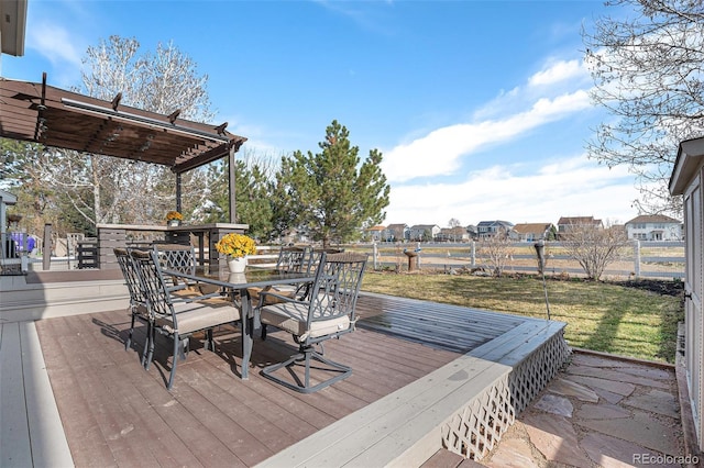 23841 E Alabama Dr, Aurora, CO 80018 - wooden deck featuring outdoor dining space and a pergola