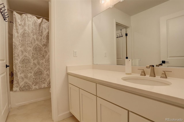 bathroom with vanity, toilet, and shower / bath combination with curtain