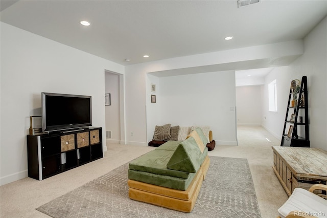 living area featuring carpet, recessed lighting, and baseboards