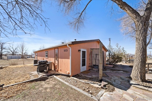 view of home's exterior featuring a patio area