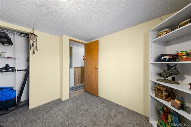 interior space featuring a textured ceiling