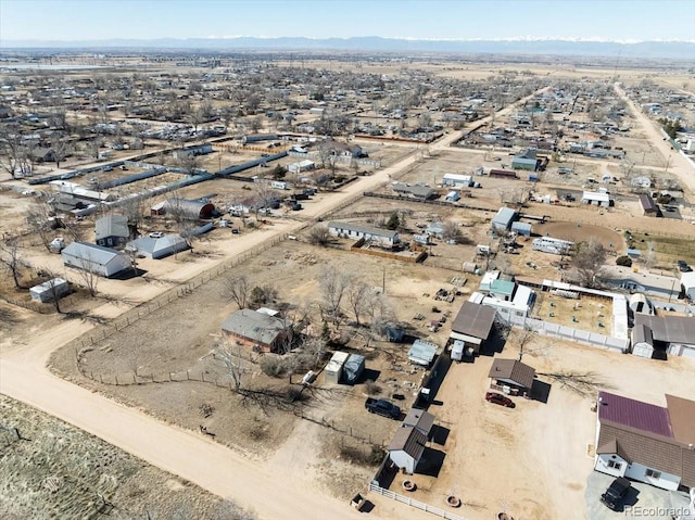 drone / aerial view with a mountain view and a desert view