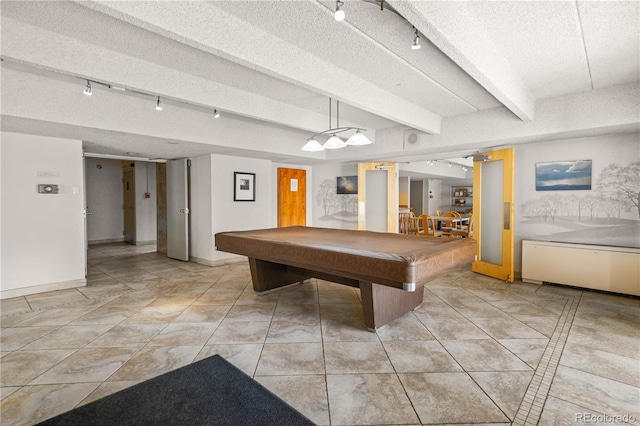 rec room featuring beam ceiling, pool table, a textured ceiling, and baseboards