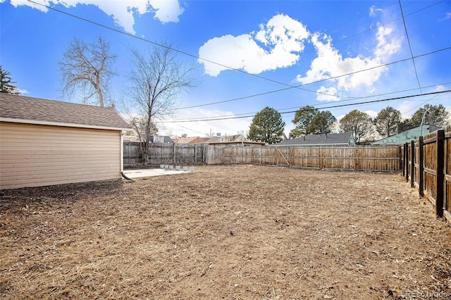 view of yard featuring a fenced backyard