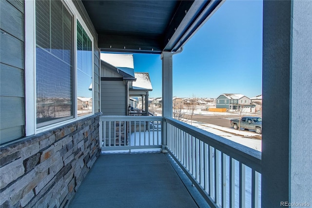 balcony featuring a residential view