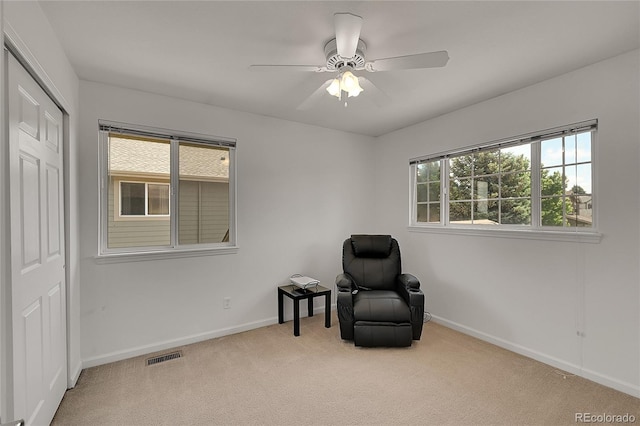 2631 S Flanders Ct, Aurora, CO 80013 - sitting room featuring carpet flooring, baseboards, and a ceiling fan
