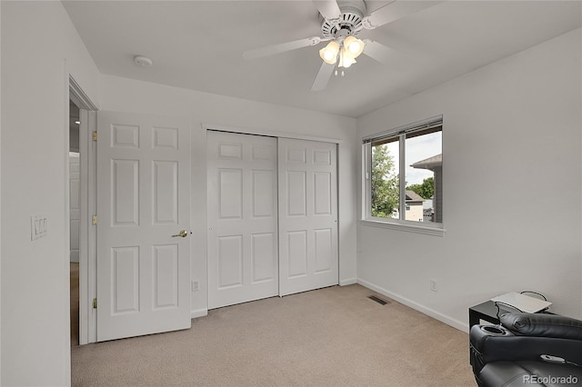 2631 S Flanders Ct, Aurora, CO 80013 - unfurnished room with light carpet, ceiling fan, and baseboards