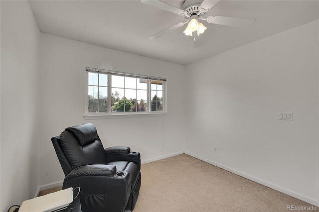 2631 S Flanders Ct, Aurora, CO 80013 - living area featuring baseboards, light colored carpet, and ceiling fan