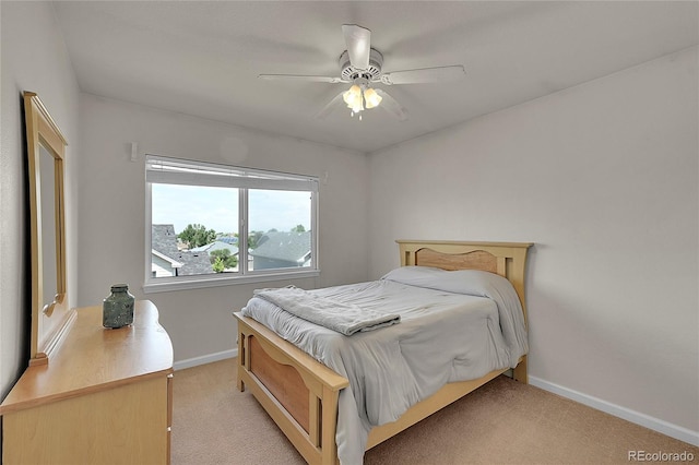 2631 S Flanders Ct, Aurora, CO 80013 - bedroom featuring light carpet, baseboards, and a ceiling fan