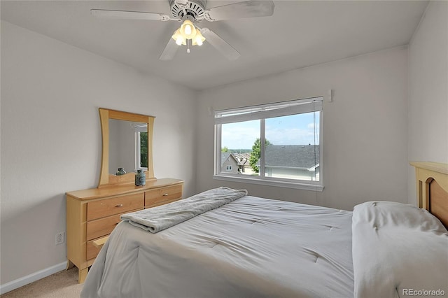 2631 S Flanders Ct, Aurora, CO 80013 - bedroom with light colored carpet, baseboards, and a ceiling fan