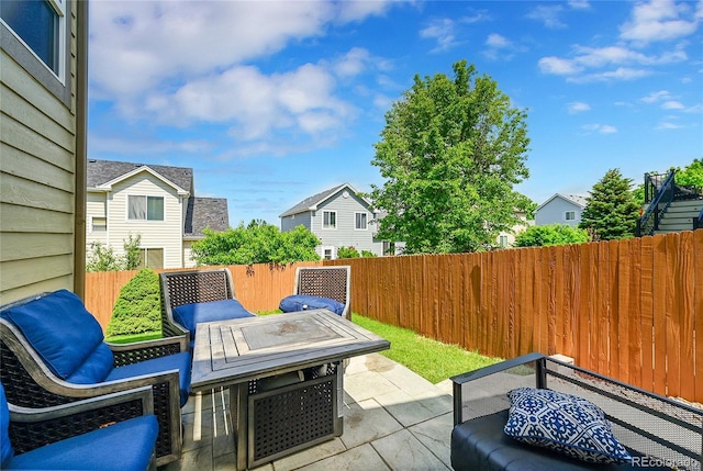 2631 S Flanders Ct, Aurora, CO 80013 - fenced backyard with a patio and a residential view