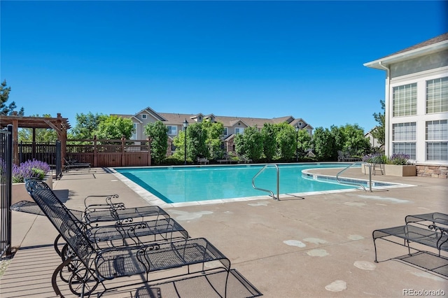 452 Black Feather Loop Unit 612, Castle Rock, CO 80104 - community pool featuring a patio area