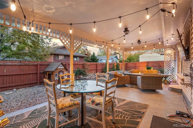 view of patio / terrace featuring outdoor lounge area, a fenced backyard, and outdoor dining area